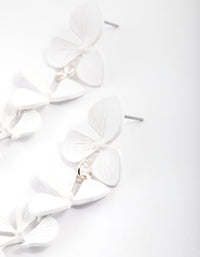 White Graduated Flower Drop Earrings - link has visual effect only