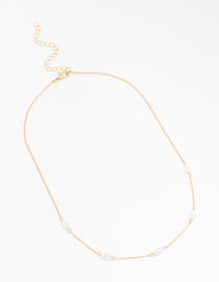 Gold Oval Pearl Station Necklace - link has visual effect only