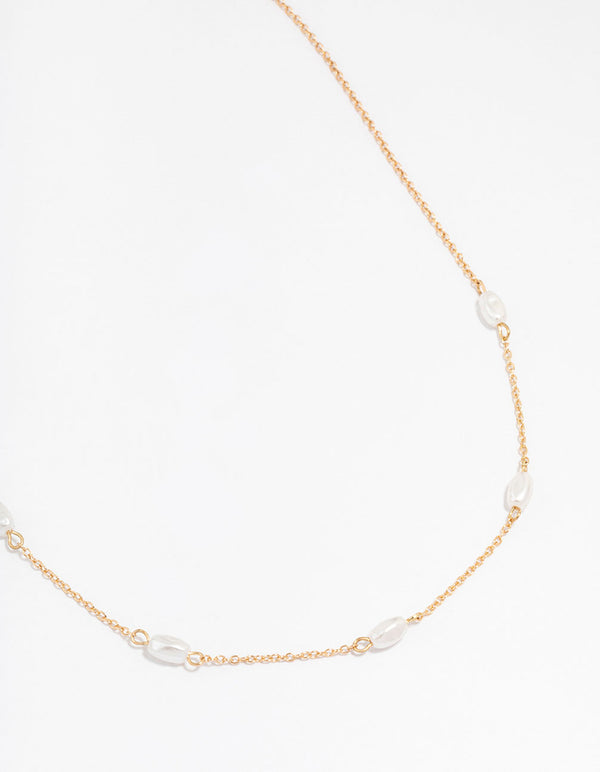 Gold Oval Pearl Station Necklace