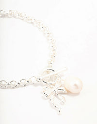 Silver Plated T & O Freshwater Pearl & Bow Charm Bracelet - link has visual effect only