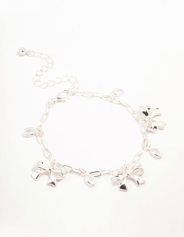 Silver Plated Alternating Cubic Zirconia & Bow Charm Bracelet